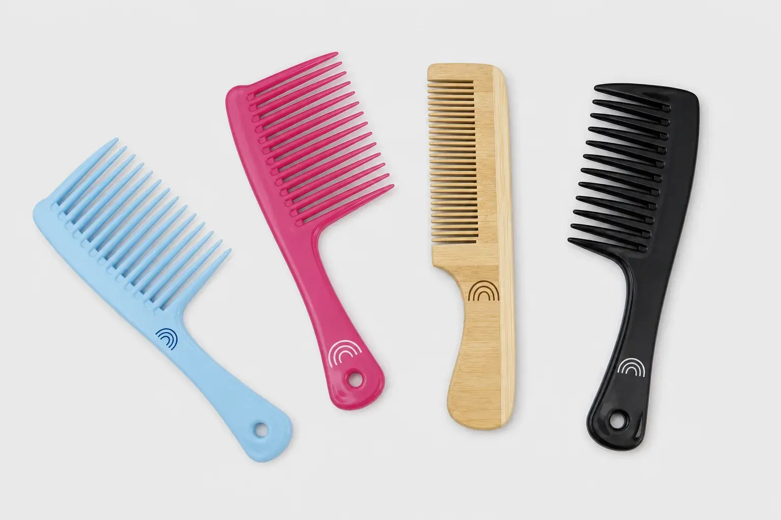 Colored logo marks shown on plastic and bamboo comb surfaces