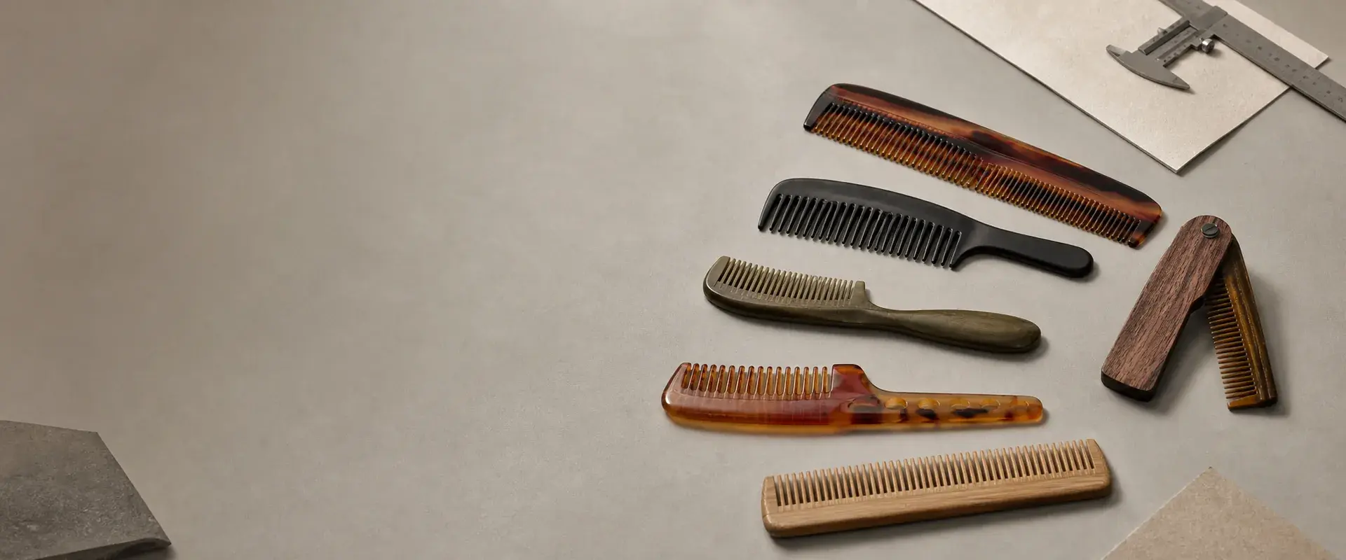 Custom comb material samples on a product development worktable
